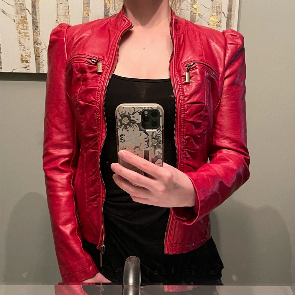 Red leather jacket, size small, shoulders puff out just a little.